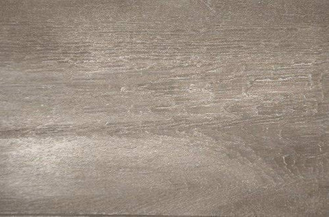 Applying Eco Wood Treatment with a brush for even coverage