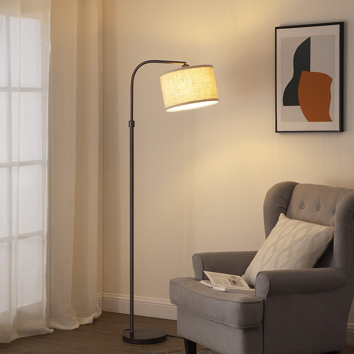 EDISHINE arched floor lamp in bronze arc for a modern living room.
