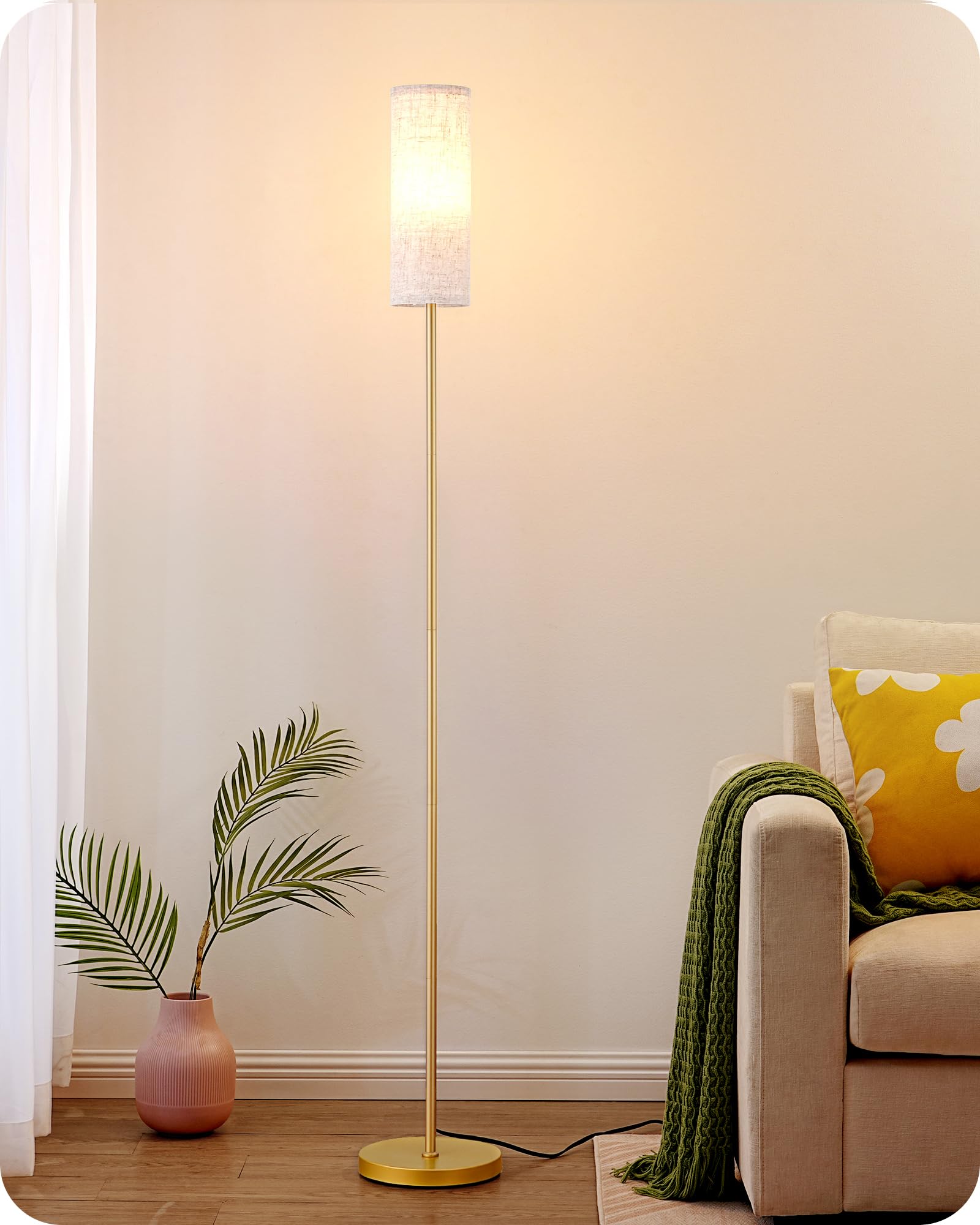 EDISHINE floor lamp in gold stands tall to brighten living spaces.