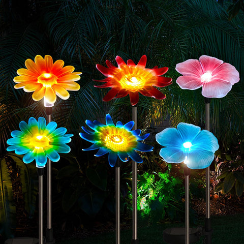 EiGreen hummingbird stake light glows at night for a charming garden accent