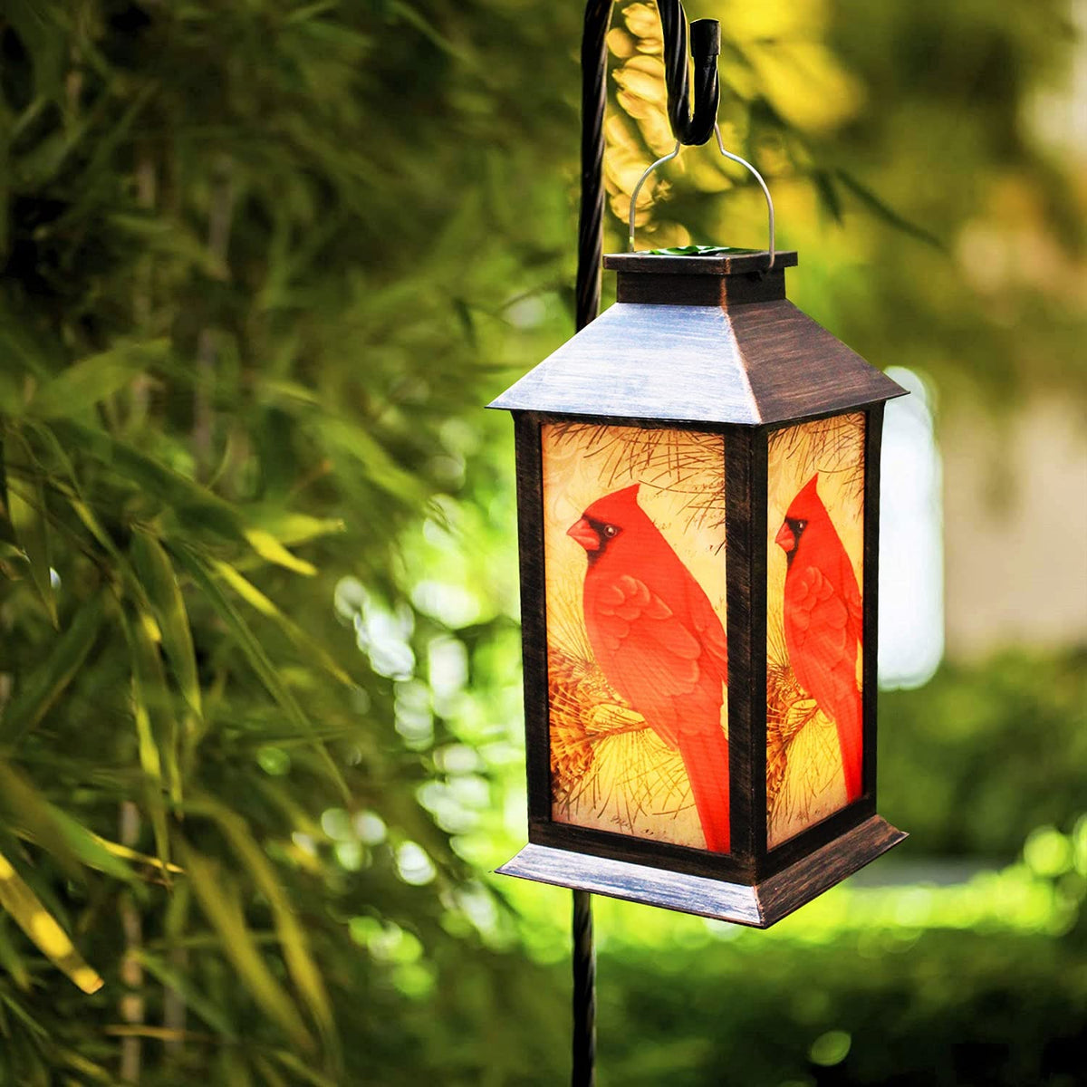 EiGreen solar lantern with red bird pattern brightens outdoor spaces at dusk