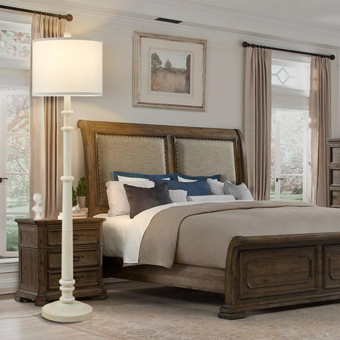 EJIAXIN crisp white fabric drum shade enhances diffuse bedside lighting.