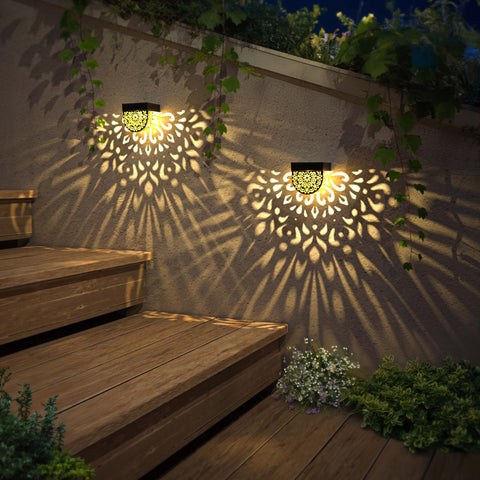 EKQ backyard post light accenting a gate and perimeter