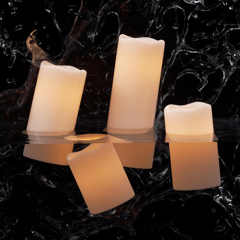 Eldnacele outdoor friendly LED candles withstand rain for deck or patio decor.