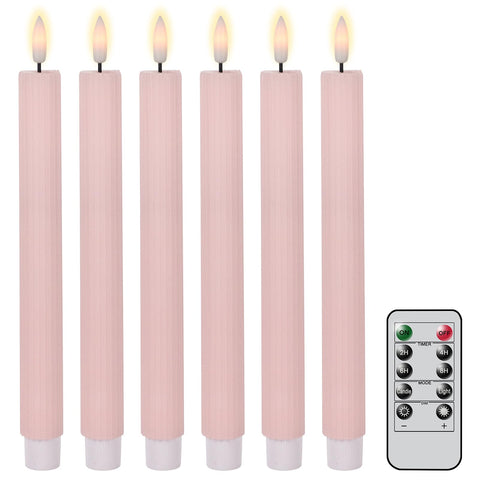 Eldnacele real wax LED taper candle in pink finish providing warm ambience