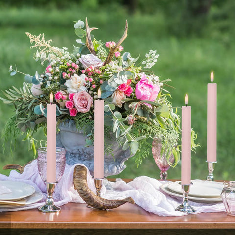 Eldnacele taper candle on dining table creating intimate ambiance