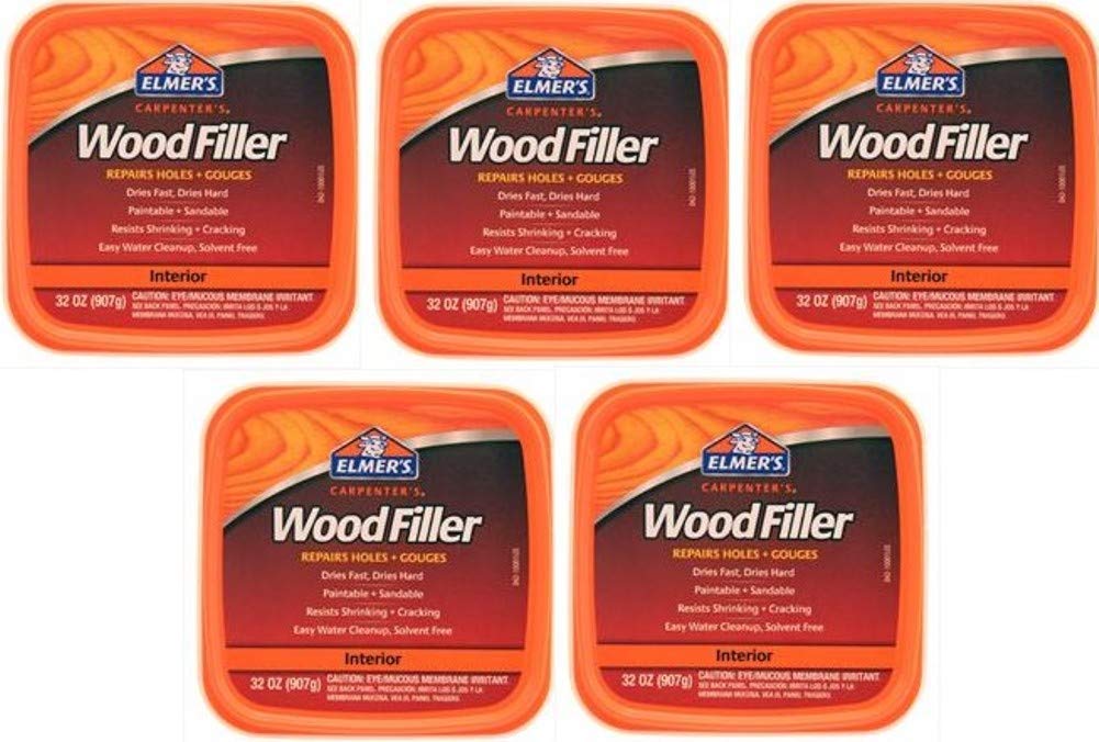 Elmer's E842L application showing smooth filling on dented wood surfaces.