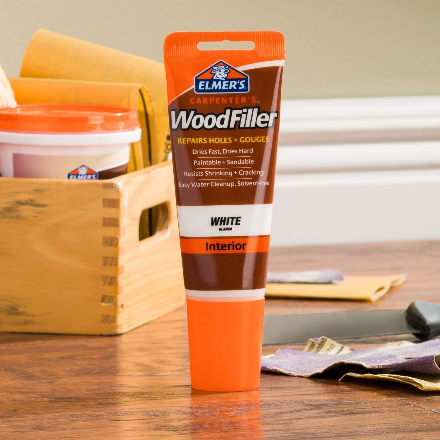 Elmer's E855 filler dries bright white and sands smooth for molding and trim.