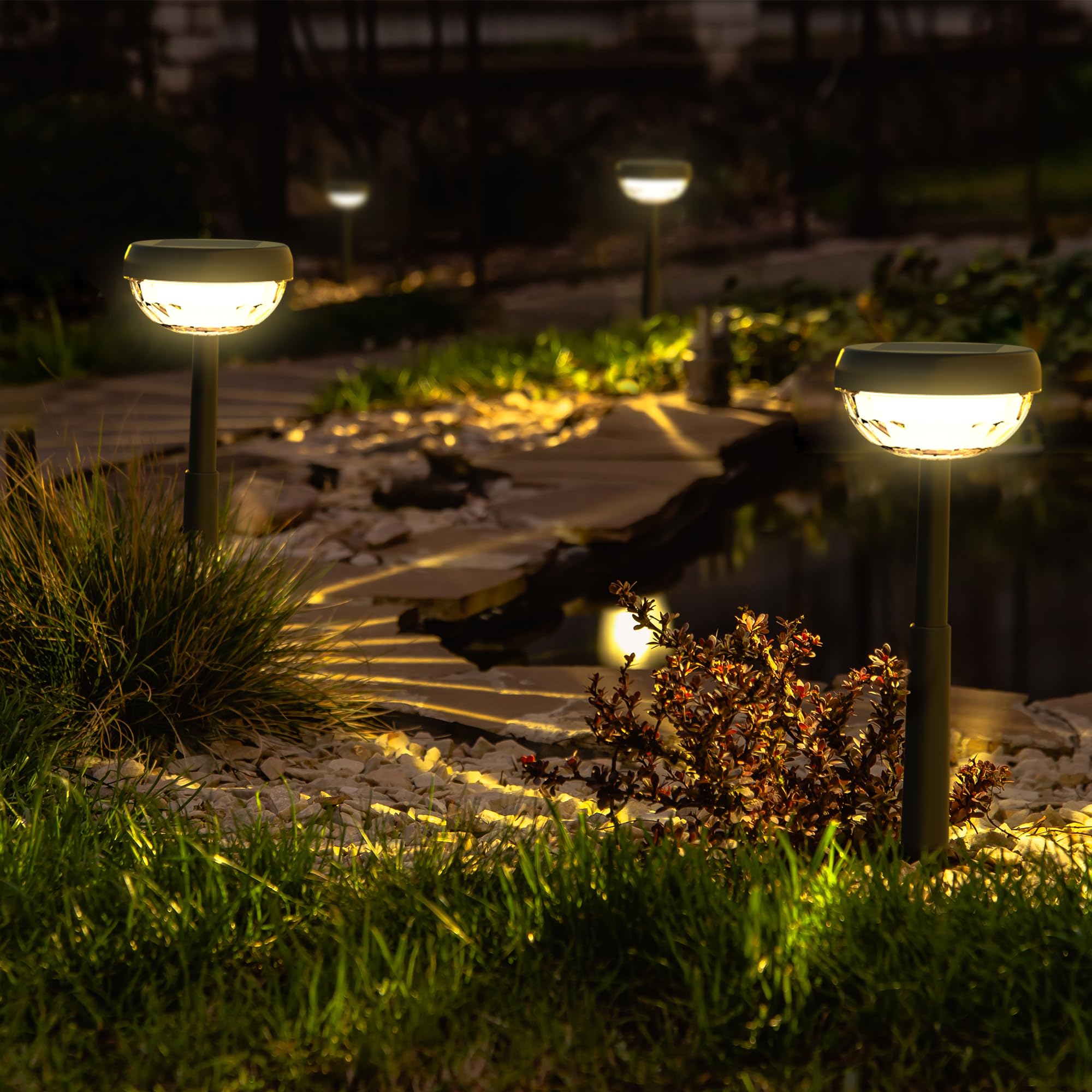 Ensenior solar yard light highlighting garden edges for ambient outdoor glow.