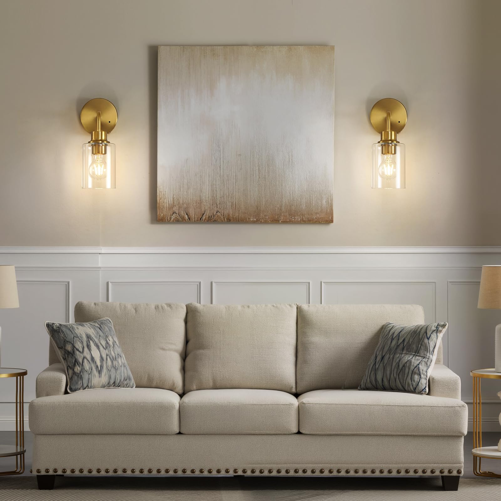 Curved arms of Epinl sconces increase light reach for reading or makeup.