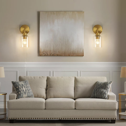 Curved arms of Epinl sconces increase light reach for reading or makeup.