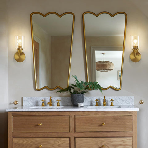 Reversible mounting options for up or down light projection with Epinl sconces.