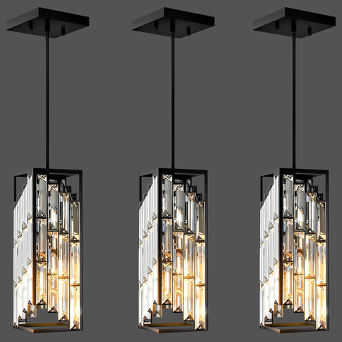 Esfos black pendant light with crystal shade over kitchen island creating elegant ambience