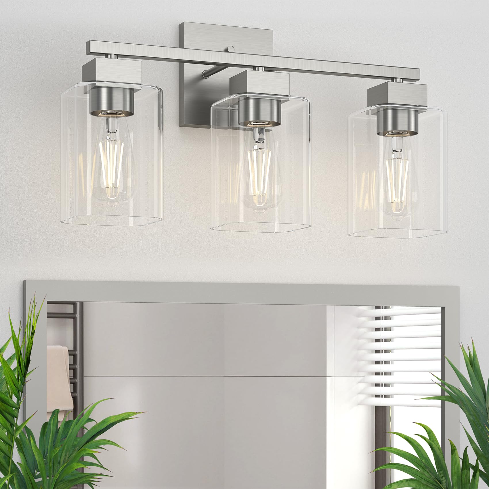 Espird Brush Nickel vanity light with square backplate for modern bathroom lighting.
