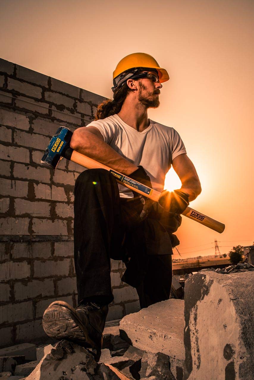 Estwing 8-Pound Sledge driving posts and bending metal in rugged conditions.