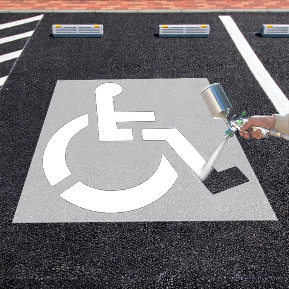 Eunika handicap stencil on asphalt creates crisp ada-symbol for parking spaces