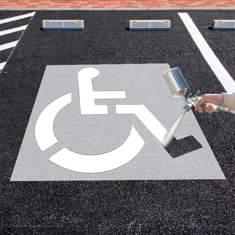 Eunika handicap stencil on asphalt creates crisp ada-symbol for parking spaces