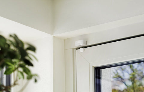 Eve Door and Window installed on door shows real-time open/closed state for automations