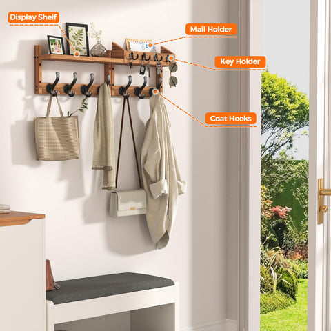 Wall-mounted mail holder and key hooks keep essentials within easy reach.