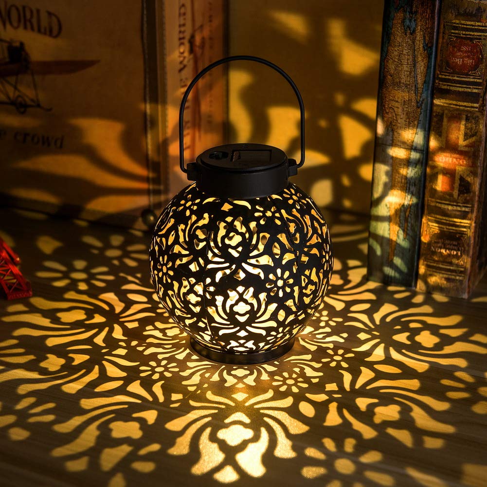 EXCMARK 2-pack outdoor solar hanging lanterns illuminate patios with metal LED glow.