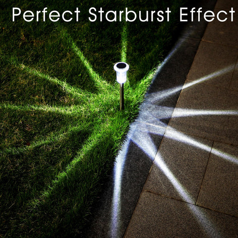 Eyrosa solar stake lights line garden borders with durable stainless steel poles.