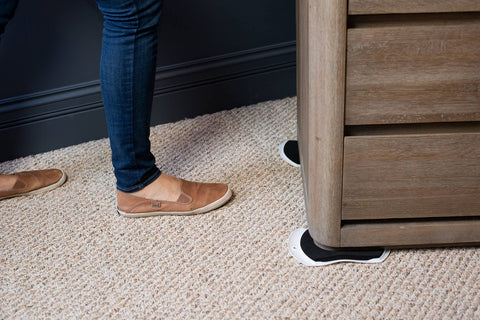 EZ Moves large slide on plush carpet close-up with curved base protection