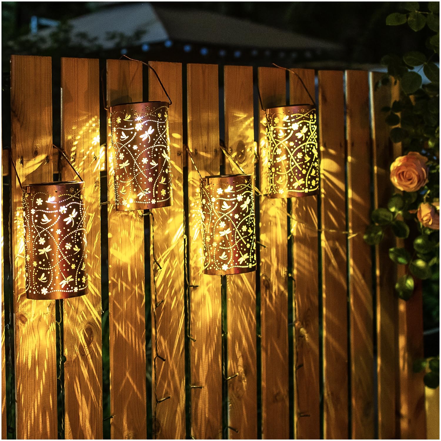EZTZEN Dragonfly solar lantern night view showing intricate metalwork