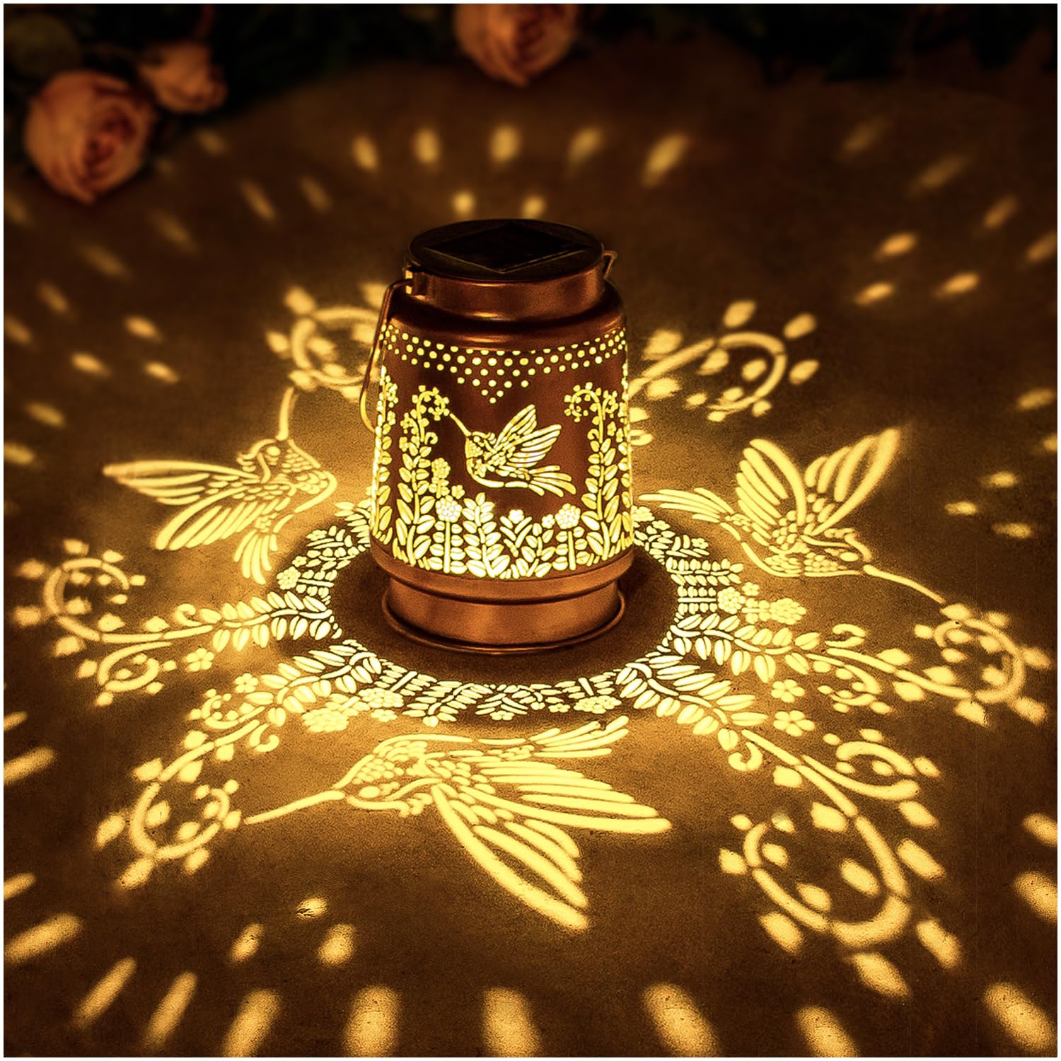 EZTZEN hummingbird solar lantern hanging in garden with warm LED glow.
