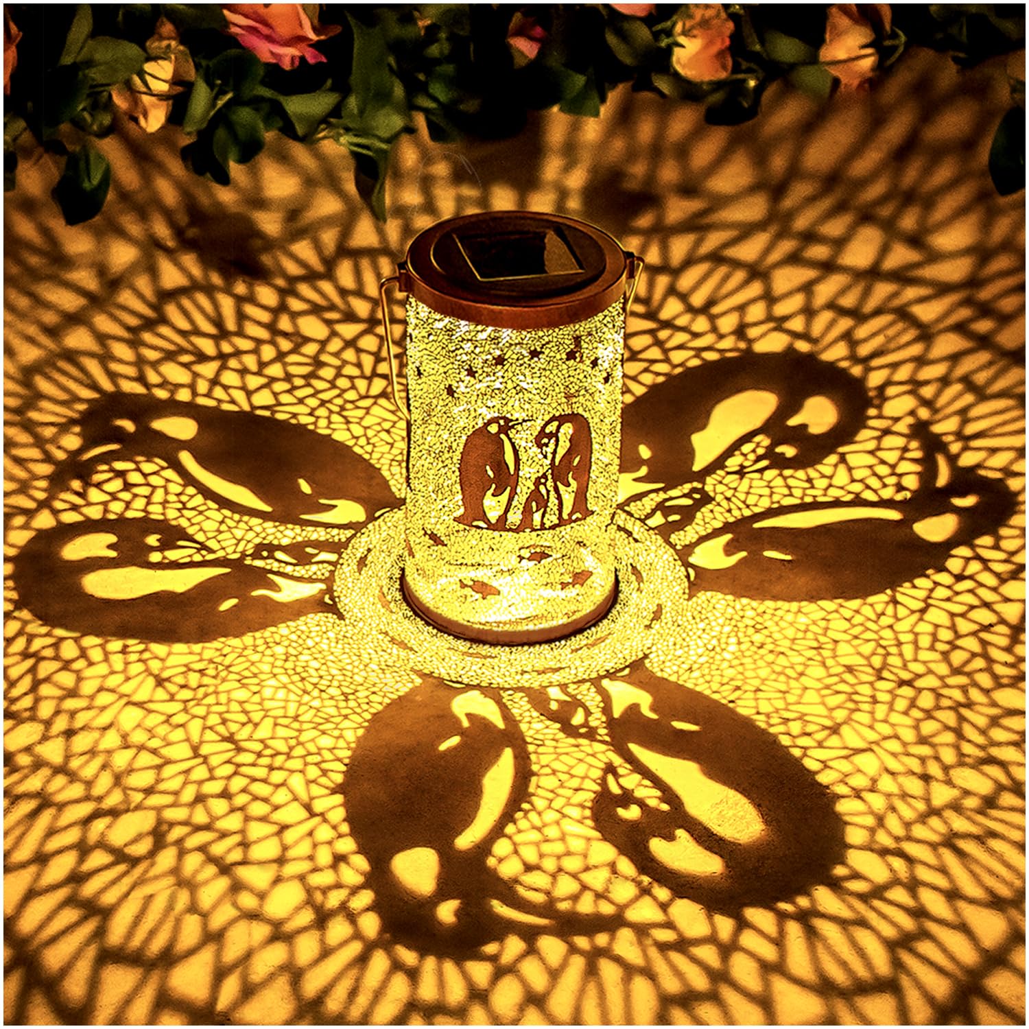 EZTZEN penguin solar lantern casts decorative patterns at dusk for cozy garden illumination.