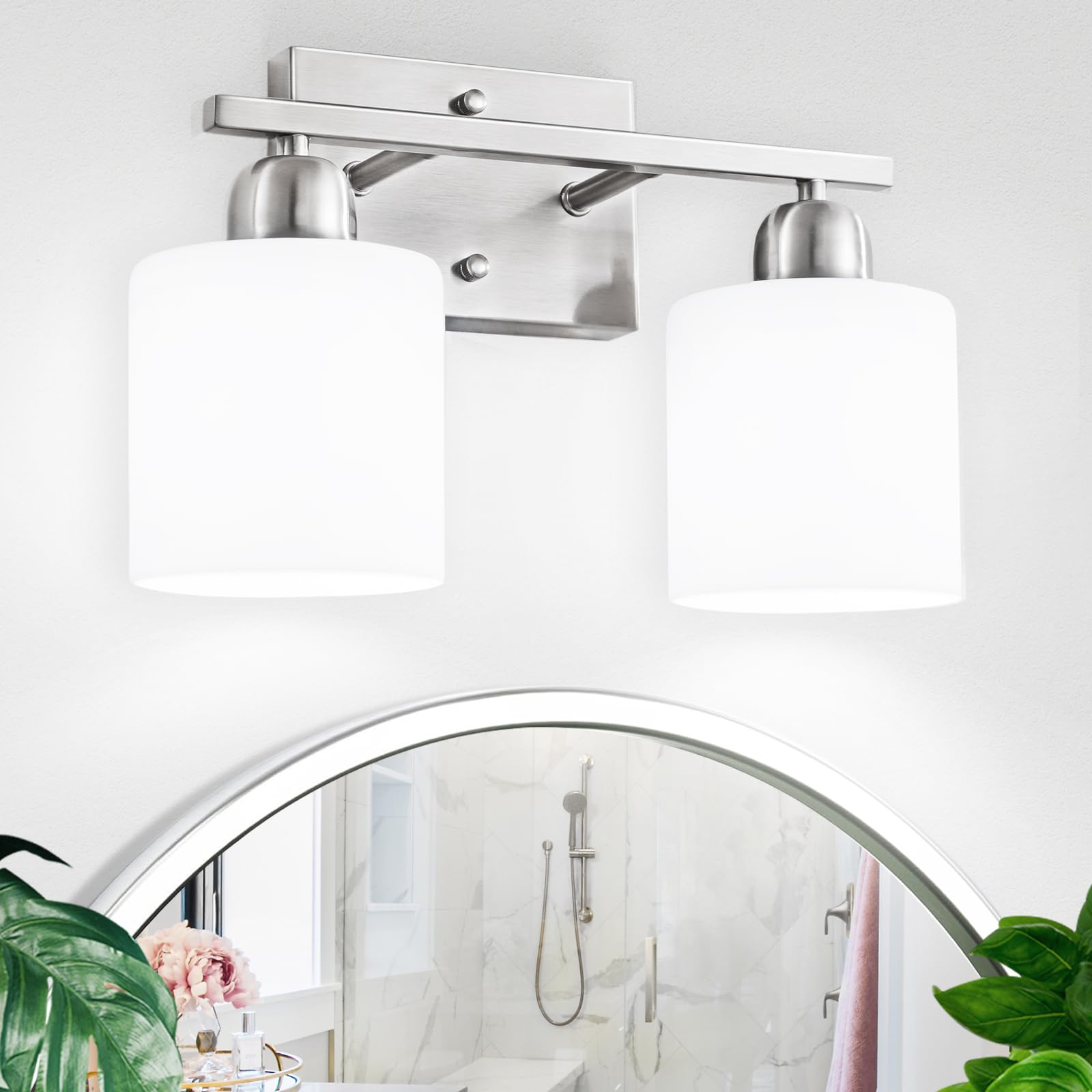 FAISHILAN brushed-nickel 2-light bathroom light illuminating a vanity mirror with balanced glow