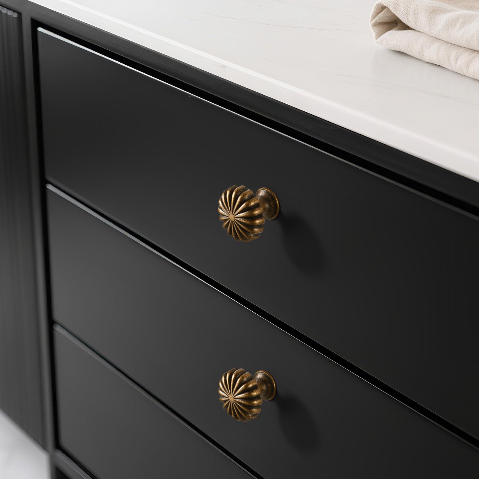 Installed on a dresser drawer for timeless charm.