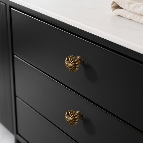 Installed on a dresser drawer for timeless charm.