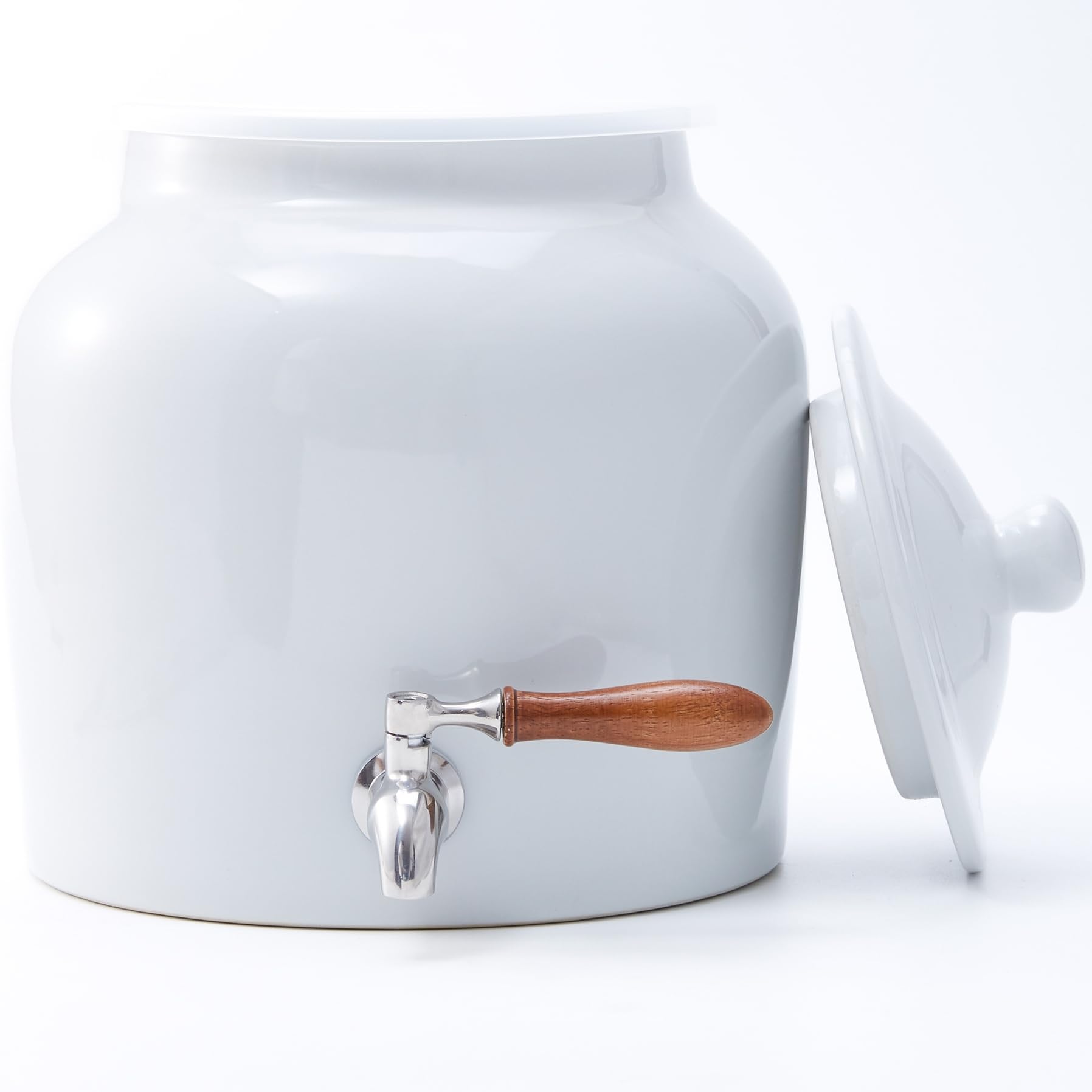 FAQQI ceramic water dispenser with a 5-gallon bottle for home use.