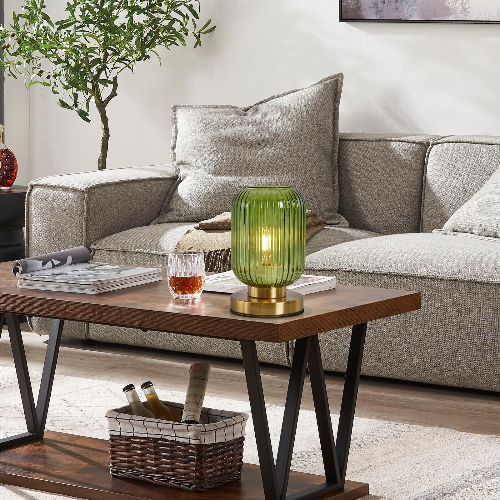 Feasey green glass shade table lamp enhances texture