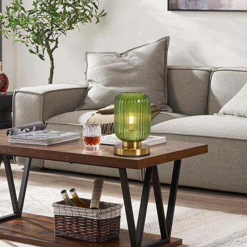 Feasey green glass shade table lamp enhances texture