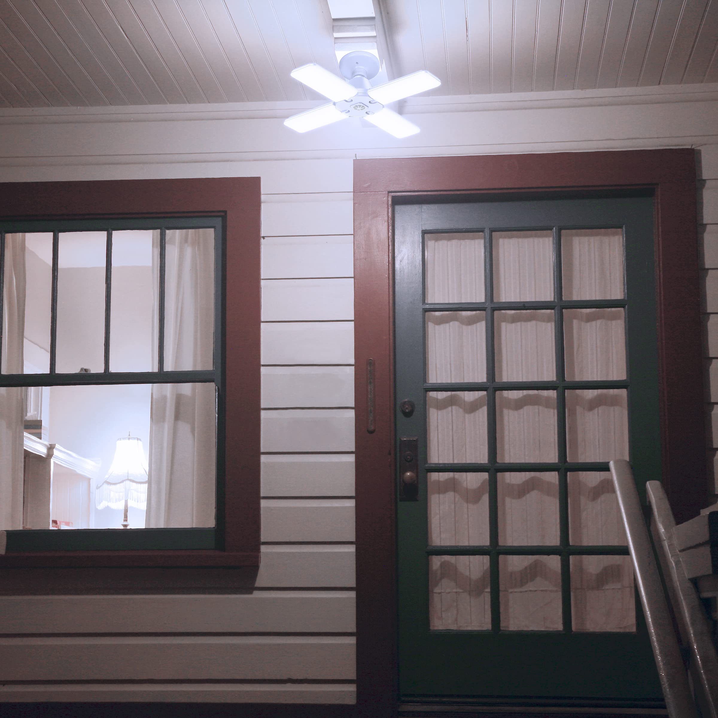Feit Electric ADJ12000 lighting a tall garage ceiling area