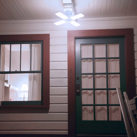 Feit Electric ADJ12000 lighting a tall garage ceiling area