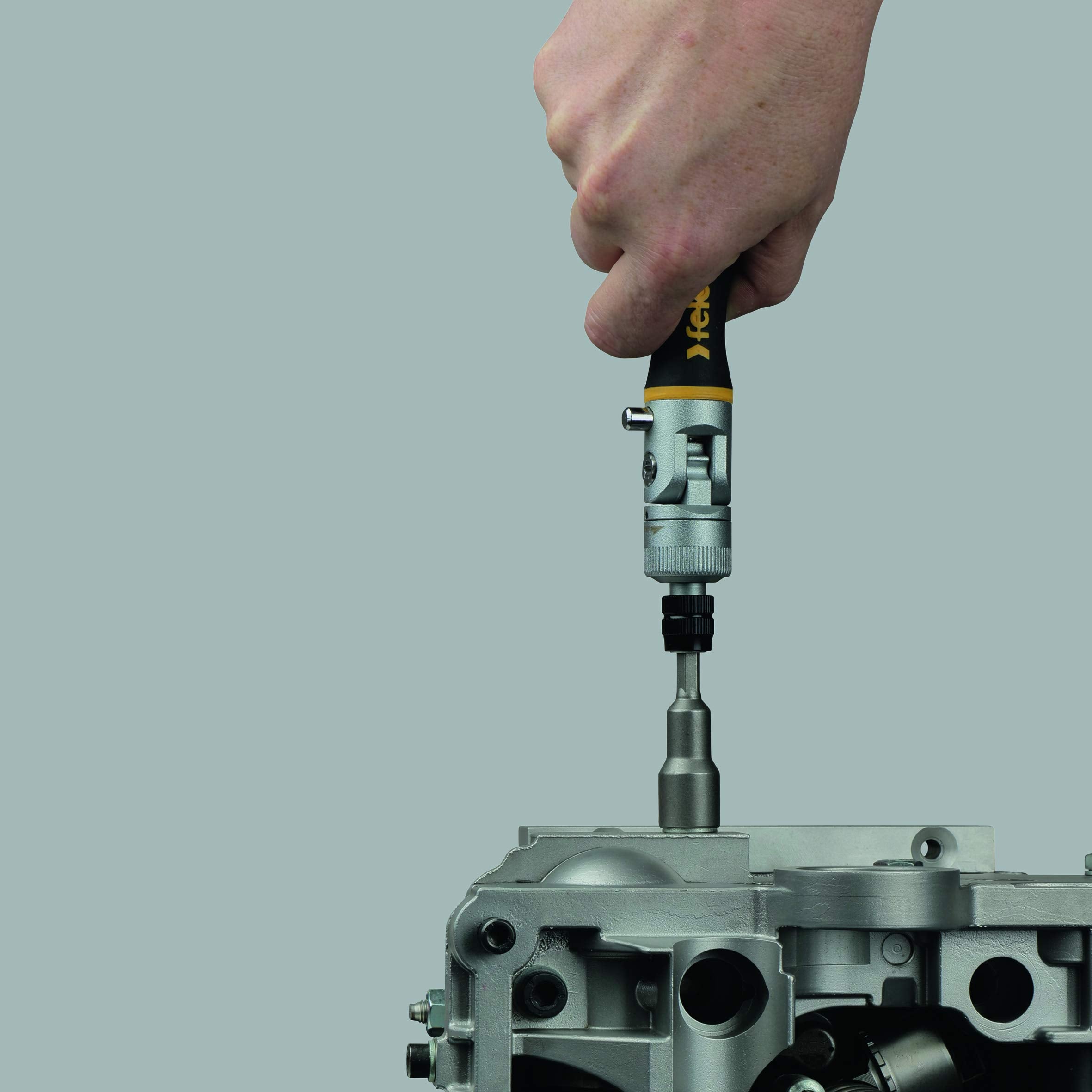 Felo Ergonic K Handle quick-release bit holder for rapid bit changes.