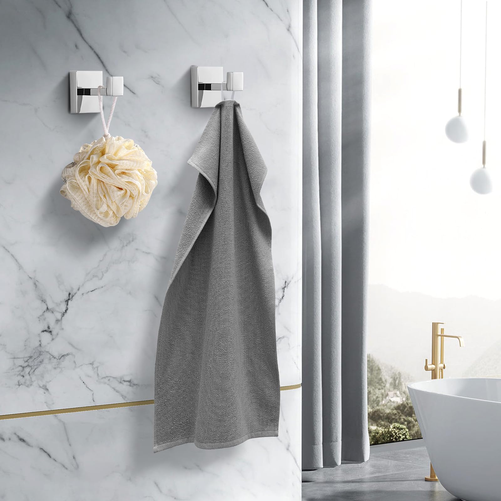 Fenas towel hook suitable for bathroom and kitchen use, blends with chrome decor.