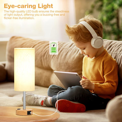Fenmzee bedside lamp includes AC outlet for additional power.