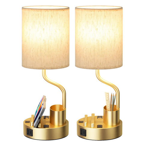 Fenmzee gold-base bedside lamp with two outlets and USB ports for convenient charging.
