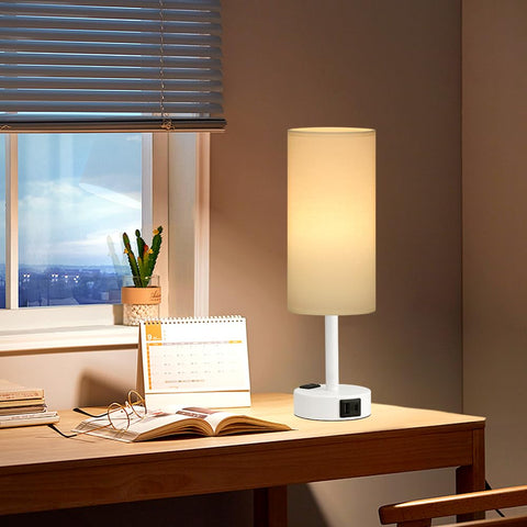 Fenmzee matte white bedside lamp on a bedside table for compact space use.