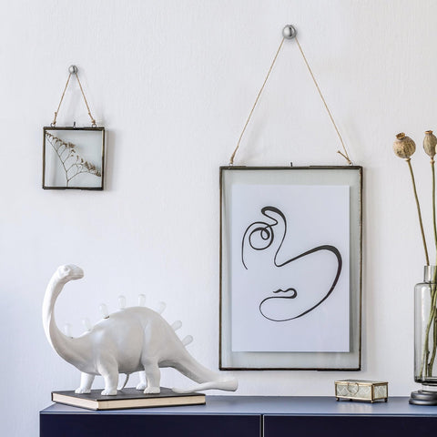 Ferraycle dual headed wall hangers securing frames with stability