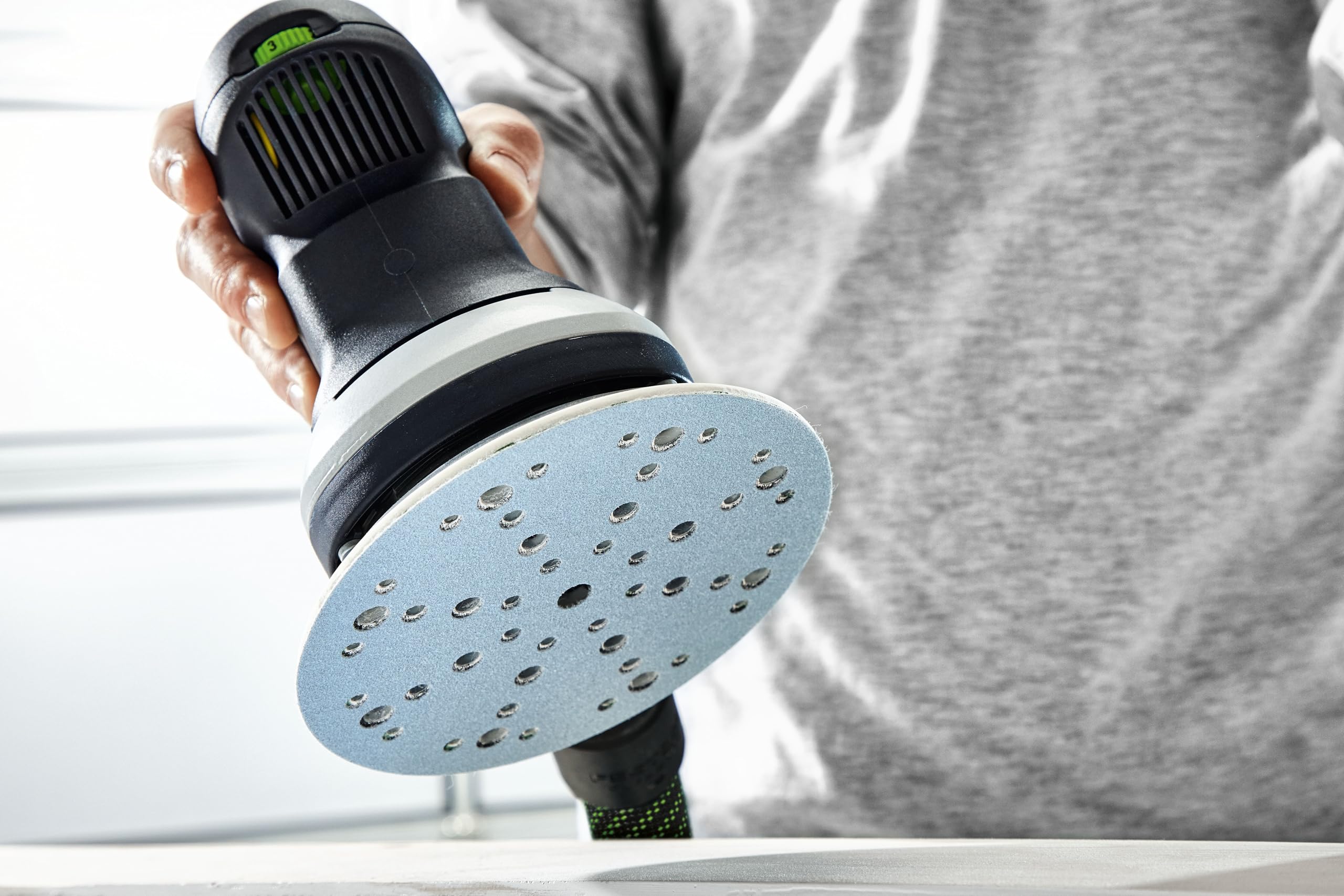StickFix fastening on Festool pad enables quick abrasive changes.
