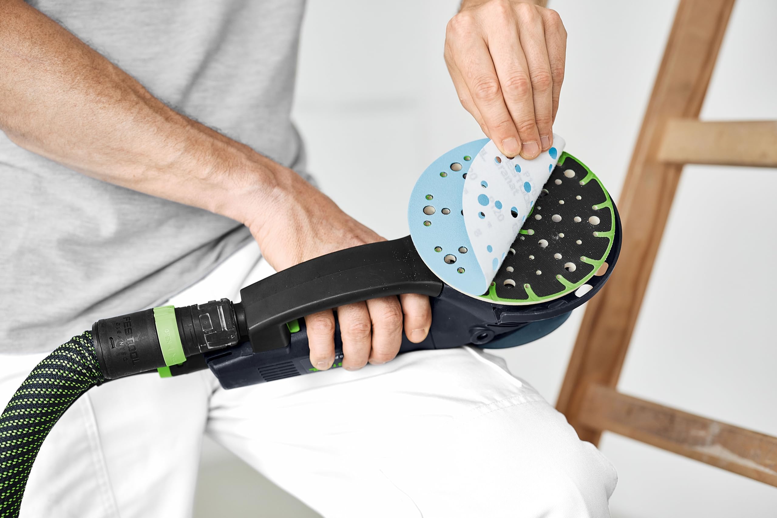 Festool Granat disc on painted surface shows VOC-friendly coating prep.