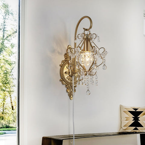 Fetason Gold Crystal Wall Sconce in a bedroom setting for warm lighting.