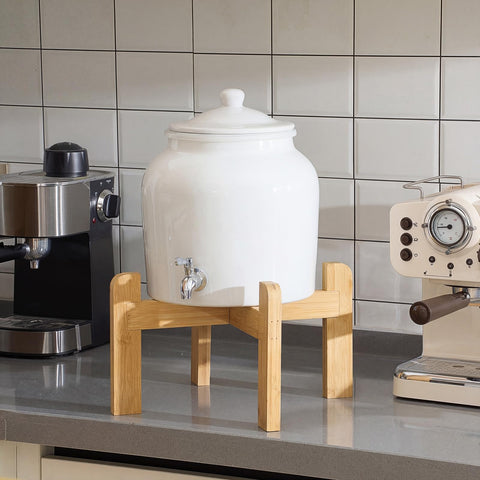 FillTouch water dispenser in use on a table, ideal for gatherings.