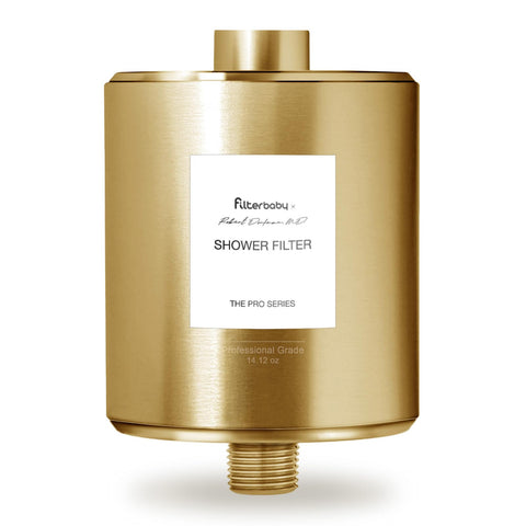 Filterbaby Titanium Shower Filter Pro front view with gold finish and durable housing