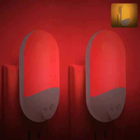 Finezeal 670nm red and amber night light glows softly in a nursery.