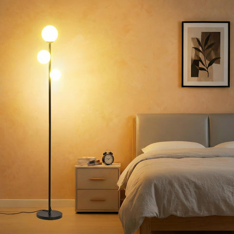 Fiqevs 3 Globe Floor Lamp front view with frosted glass spheres for warm ambient lighting.